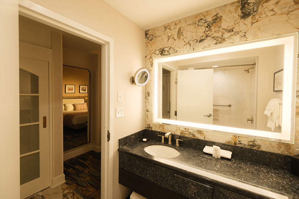deluxe room bathroom sink and mirror