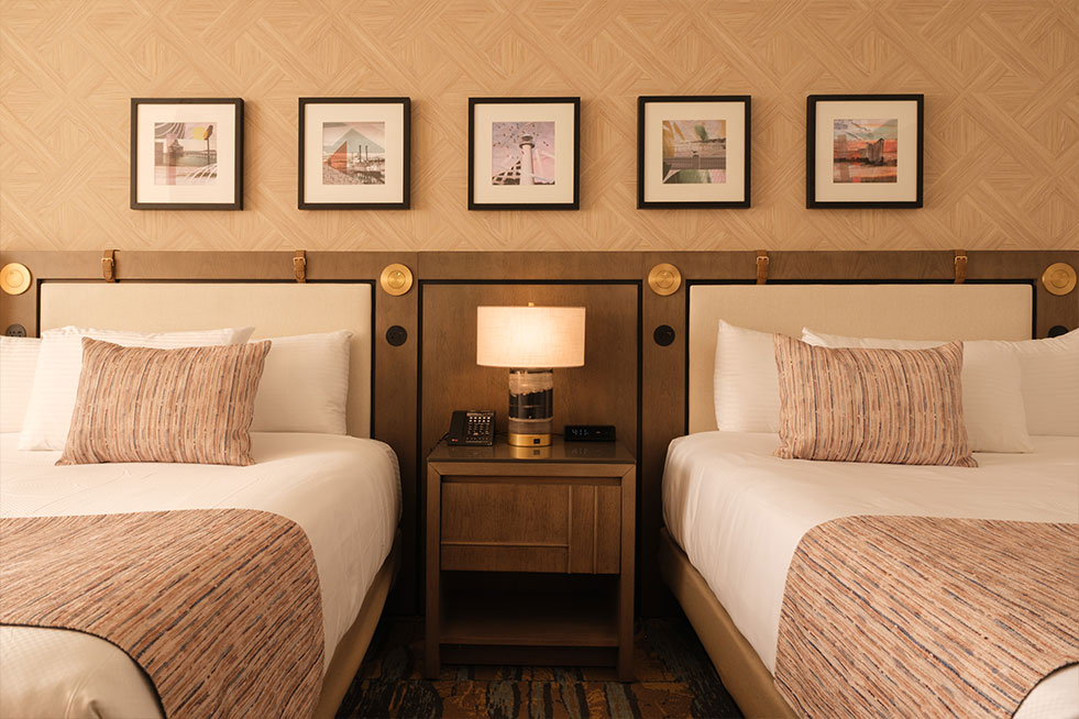 deluxe room two beds and lamp