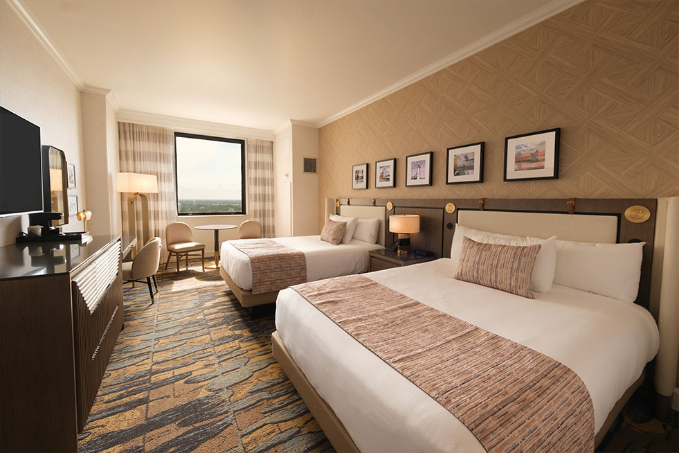 deluxe room two beds wide angle room shot